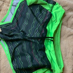 GREEN NIKE DRIFIT SHORTS